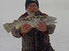 3/23/13- John Morris with a nice brown trout caught through the ice behind the State Dock
